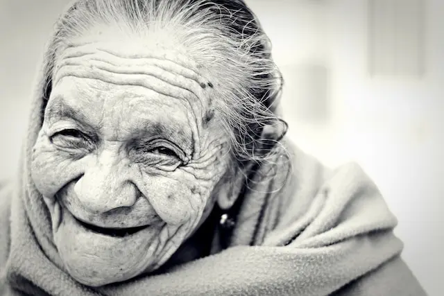 elderly woman with no teeth